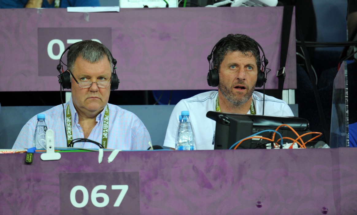 Television commentators Clive Tyldesley and Andy Townsend working for ITV from the United Kingdom - England at Euro 2012 (Photo by AMA/Corbis via Getty Images)